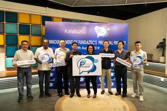 Jeffrey Chew, Chairman of  Peoplender Sdn Bhd and  Kristine Ng, CEO of  Peoplender Sdn Bhd with the  Shareholders and Elite Investors at the introduction of Principal Protect. 