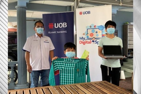 UOB Malaysia donates laptops and Raya goodies to underprivileged children to celebrate the festive season